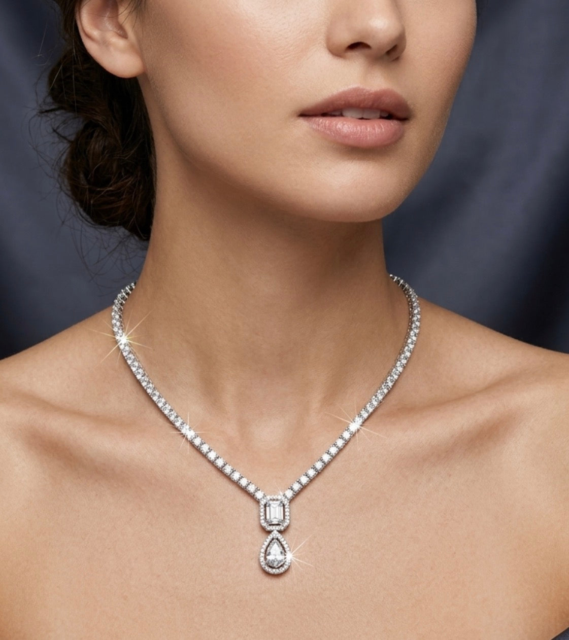 Sterling Silver Elegant Teardrop, Round & Emerald Cut Cubic Zirconia Necklace