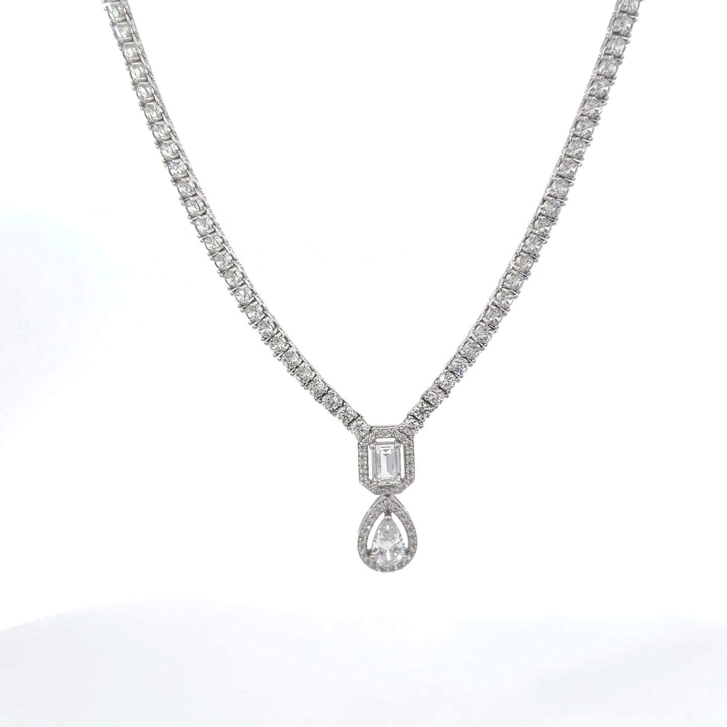 Sterling Silver Elegant Pear Shape, Round & Emerald Cut Cubic Zirconia Necklace